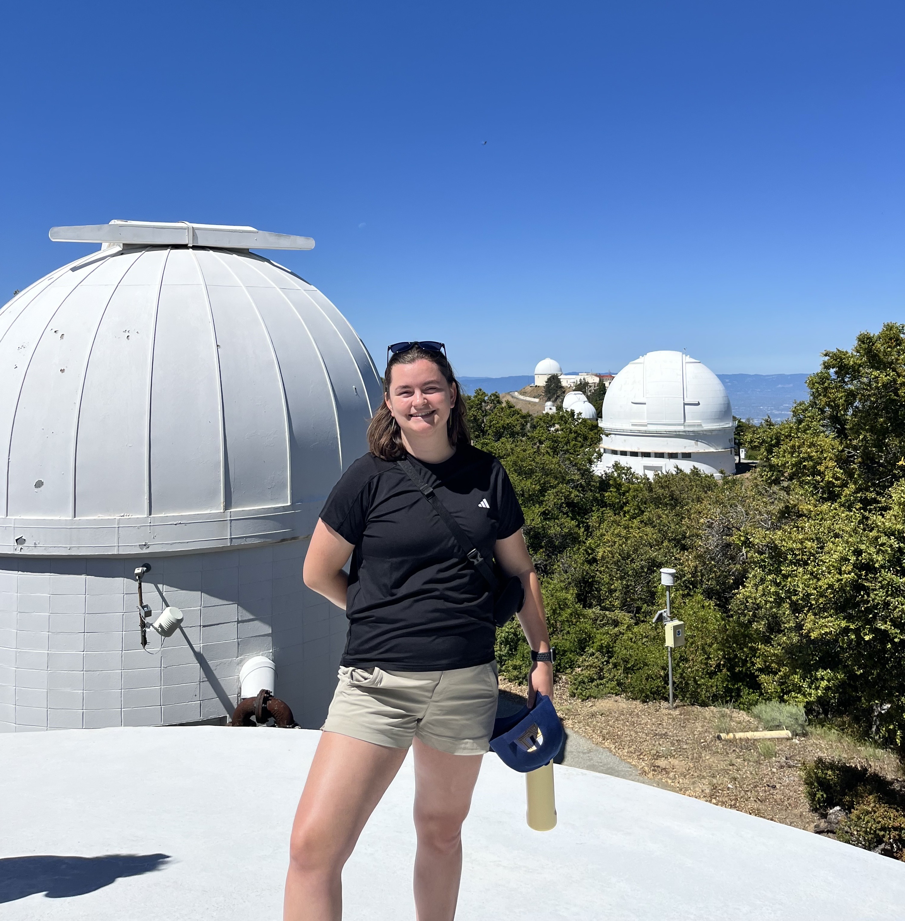 Samantha in front of the Lick Observatory telescopes